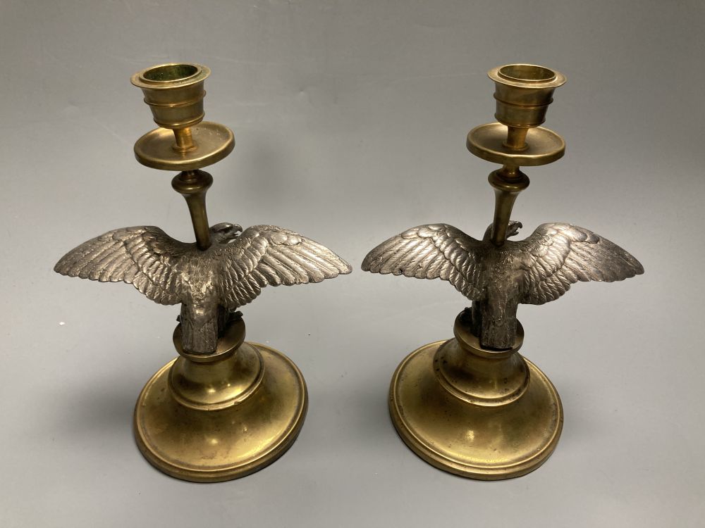A pair of brass and spelter eagle candlesticks, height 19cm